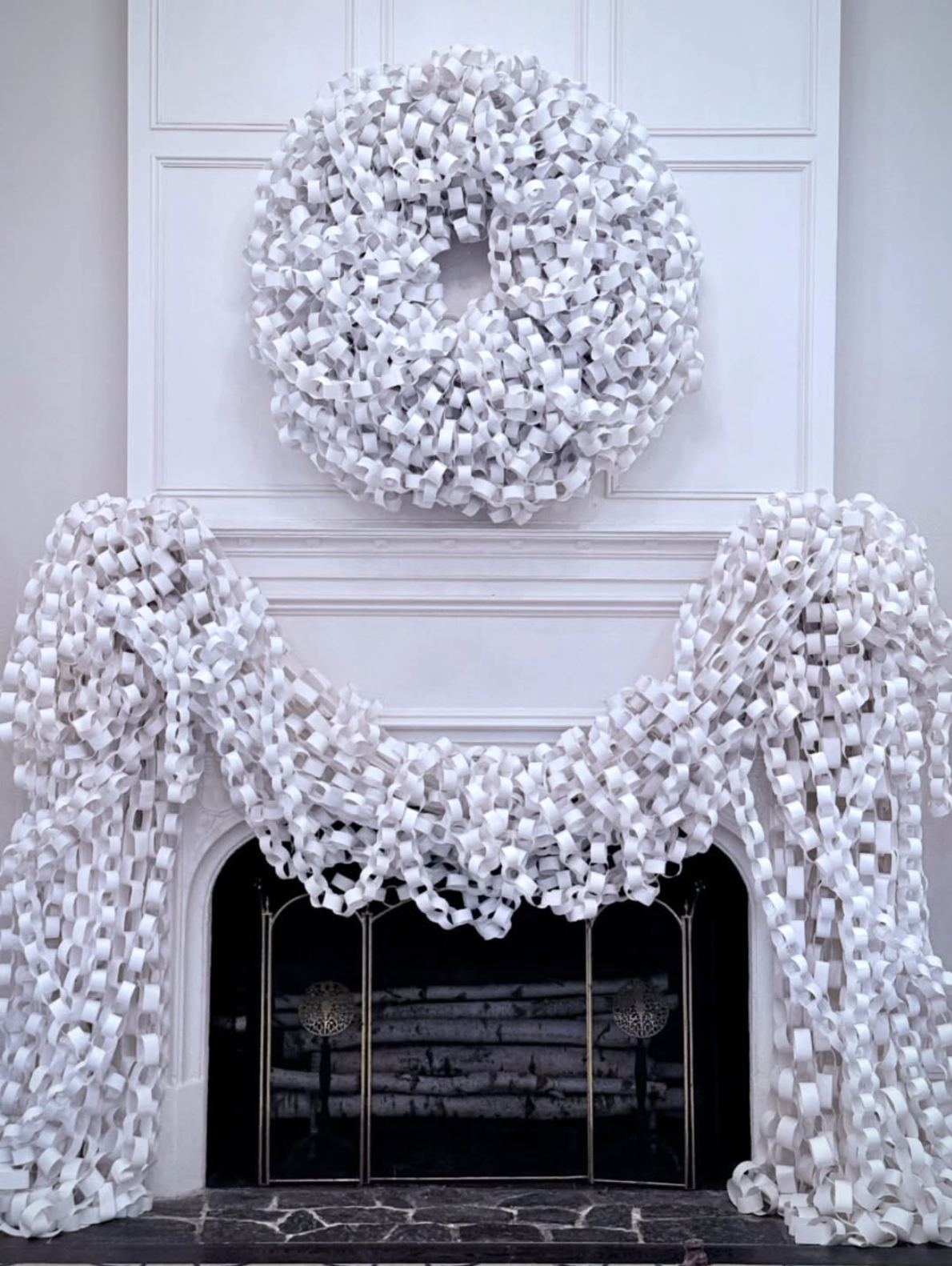 Paper chain Christmas wreath and garland mantel